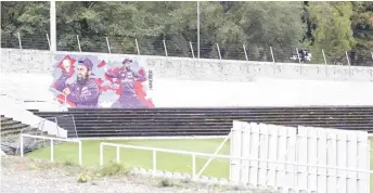  ?? — AFP photo ?? A mural of England and Yorkshire cricketer Adil Rashid, who was born in Bradford, adorns a wall of Park Avenue Cricket Ground in Bradford, northern England.