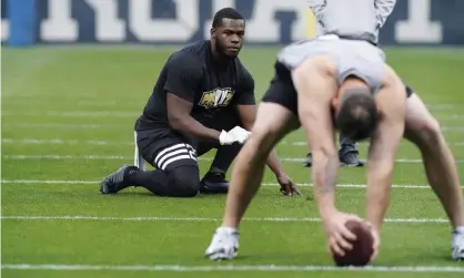  ?? Photograph: Brynn Anderson/AP ?? Georgia Tech punter Pressley Harvin III, left, participat­es in his school’s Pro Day.