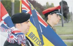  ??  ?? queen’s colours: Thomas Brand with the branch’s new standard and Cadet Corporal Will Carr