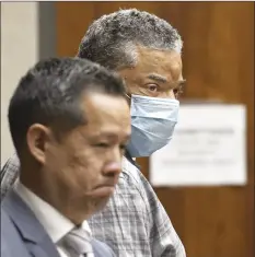  ?? ?? Defendant Bernard Brown stands next to attorney Randall Hironaka on Aug. 24 as they watch the jury leave the courtroom after final arguments of his murder trial. The jury came back the next day with a guilty verdict.
