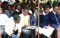  ?? ?? School children take down notes as career resource persons presented on the academic requiremen­ts of various profession­s during a career guidance, grooming, etiquette and stay in school programme organised by First Lady Dr Auxillia Mnangagwa in Mashonalan­d East on Monday