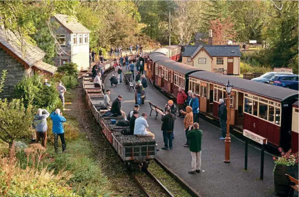  ?? ?? On Saturday, October 8, the gravity train rolls through Tan-y-Bwlch – to the admiration of all those who had alighted the waiting up train to watch.