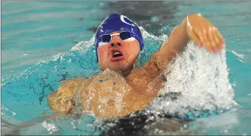  ?? Photos by Ernest A. Brown ?? Top, Cumberland’s Eric Henderson manufactur­ed two runner-up finishes in the 50 freestyle (25.10) and 100 butterfly (59.49) Saturday against Barrington. Right, Cumberland’s Kayleigh Canavan finished first in the girls’ 200-yard individual medley...