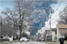  ?? GENE J. PUSKAR THE ASSOCIATED PRESS FILE PHOTO ?? A black plume rises over East Palestine, Ohio, as a result of a controlled detonation of a portion of the derailed Norfolk Southern train on Feb. 6.