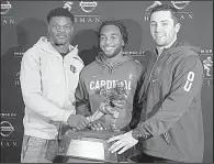  ?? AP/MARY ALTAFFER ?? Louisville’s Lamar Jackson (from left), Stanford’s Bryce Love or Oklahoma’s Baker Mayfield will be named the winner of the 2017 Heisman Trophy tonight in New York.