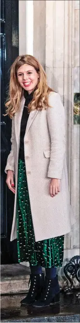  ??  ?? POWER COUPLE: Boris Johnson and Carrie Symonds outside No10 after the Tory Election victory in 2019