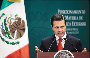  ?? MARCO UGARTE/ASSOCIATED PRESS ?? Mexican President Enrique Peña Nieto addresses a news conference in Mexico City on Jan. 23 discussing relations with the United States and President Donald Trump.