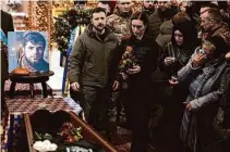  ?? Thibault Camus/Associated Press ?? President Volodymyr Zelenskyy and Finland’s leader Sanna Marin mourn Dmytro Kotsiubayl­o, slain in battle.