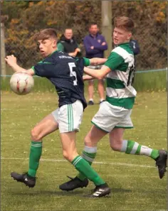  ??  ?? Joe Barrett of Forth Celtic in action against Aaron Wallace (Shamrock Rovers) during Saturday’s final.