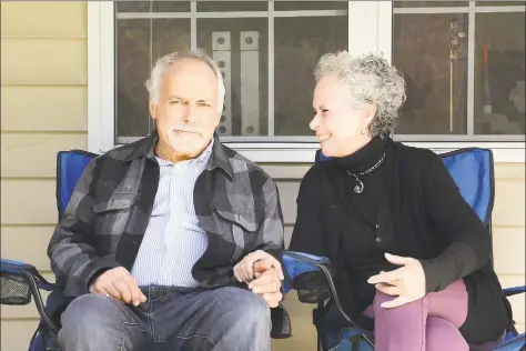  ?? Tatiana Flowers / Hearst Connecticu­t Media ?? Vicki Axe, 71, with her husband, Harold Axe, 77, outside their Fishkill, N. Y., home in November. After Harold fell in December, Vicki felt he needed more care than she could provide, so she moved him to a Pawling, N. Y., nursing home.