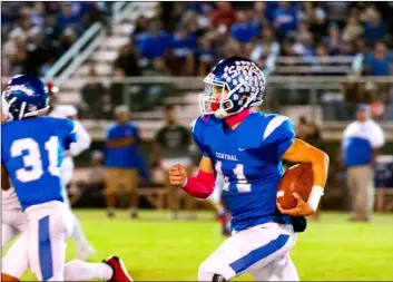  ?? IVP FILE PHOTO ?? In this Oct. 19, 2019 file photo, Central QB Deniro Osuna is on the move i photo during the Spartans’ 38-7 win over Imperial at Cal Jones Field.