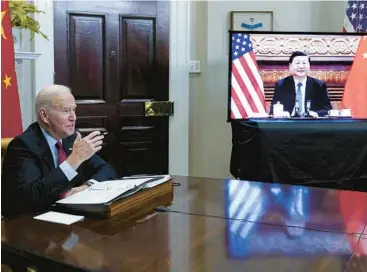  ?? SUSAN WALSH/AP ?? President Biden met virtually with Chinese President Xi last year. The two will meet in person Monday.