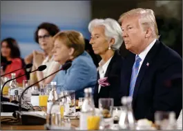  ?? Bloomberg photo by Cole Burston ?? President Donald Trump listens during a Group of Seven meeting Saturday in Quebec.