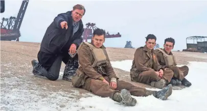  ?? PHOTOS BY WARNER BROS. ?? Christophe­r Nolan, left, did extensive research on the Battle of Dunkirk, but the movie’s characters are fictional.