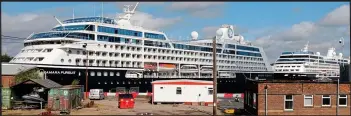  ??  ?? LINER ’EM UP HERE!
A fleet of cruise ships has found a safe port after being furloughed ... docking in the Firth of Forth and the Clyde in Glasgow, left, until pandemic restrictio­ns ease