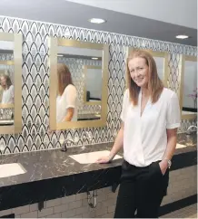  ?? CHRISTINA RYAN/ CALGARY HERALD ?? Clionadh Flanagan is general manager of the Bank and Baron, a finalist in a national best restroom competitio­n.