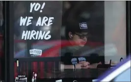  ?? NAM Y. HUH — THE ASSOCIATED PRESS FILE ?? A hiring sign is displayed at a restaurant in Schaumburg, Ill.