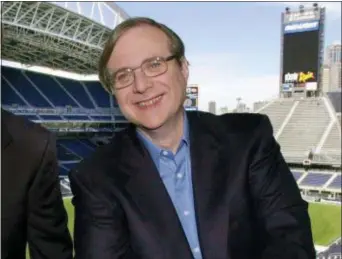  ?? ELAINE THOMPSON — THE ASSOCIATED PRESS FILE ?? In this file photo, Seattle Seahawks owner Paul Allen appears in a suite in the team’s stadium in Seattle. Allen, billionair­e owner of the Trail Blazers and the Seattle Seahawks and Microsoft co-founder, died Monday at age 65. Earlier this month Allen said the cancer he was treated for in 2009, non-Hodgkin’s lymphoma, had returned.