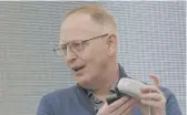  ?? TED S. WARREN/AP FILE PHOTO ?? Amazon executive Dave Limp holds an Echo Dot with Clock device. The devices will enable telemedici­ne visits via Alexa.