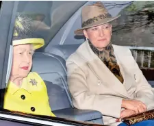  ??  ?? Sunday best: Queen and Sophie go home in Bentley