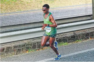 ?? /Gallo Images/ Amesh Debiky ?? Steady energy: SA ultramarat­hon runner Bongmusa Mthembu. Marathon running relies more heavily, though not exclusivel­y, on aerobic capacity.