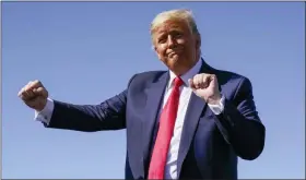  ?? ALEX BRANDON — THE ASSOCIATED PRESS ?? President Donald Trump dances after speaking at a campaign rally at Prescott Regional Airport Monday in Prescott, Ariz.