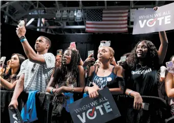  ??  ?? The crowd at a get-out-the-vote rally during a speech by Michelle Obama, Miami, Florida, September 2018