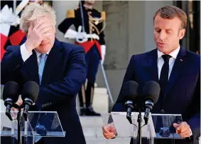  ?? ?? No entente cordiale: PM winces during past meeting with Macron