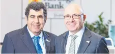  ?? Picture: Contribute­d ?? HALF-YEAR: Heritage Bank chairman Kerry Betros (left) and CEO Peter Lock have revealed the company’s half year results.