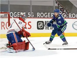  ?? BOB FRID/USA TODAY SPORTS ?? Canadiens goalie Carey Price (31) makes a save on Canucks forward Tyler Motte (64) in the third period Wednesday.