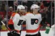  ?? CARLOS OSORIO — THE ASSOCIATED PRESS ?? Flyers right wing Jakub Voracek (93) congratula­tes teammate left wing Oskar Lindblom after a goal during the first period Sunday.