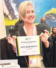  ?? ?? CEO of Plett Tourism, Patty Butterwort­h with an award for Plett’s dedication to the environmen­t at the World Travel Market in Cape Town.