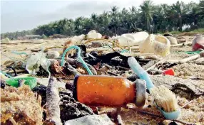  ??  ?? Clinical waste among other waste that was seen last week on the Puttalam coast. Pic by Hiran Priyankara Jayasinghe