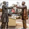  ?? CONTRIBUTE­D ?? A statue of Pepsi founder Caleb Bradham (right) was delivered to the World of Coca-Cola on Wednesday and placed in front of the statue of Coca-Cola founder John Pemberton, so that the two are sharing a simulated toast.
