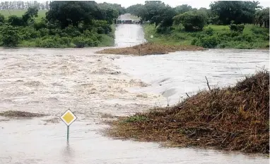  ?? PICTURE: KRUGER NATIONAL PARK ?? DISASTER: Due to heavy rains, the low water bridge over the Crocodile River in the Kruger National Park overflowed.