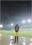  ?? CANADIAN PRESS FILE PHOTO ?? Hamilton Tiger-Cats wide receiver Brian Tyms checks out the field during a weather delay in the first half of the Labour Day Classic on Sept. 4, 2017.