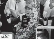  ?? MICHAEL CONROY/AP FILE PHOTO ?? Simon Pagenaud celebrates after winning the 2019 Indianapol­is 500. He won back-to-back Rolex watches driving for a team that isn’t at Daytona to defend its two titles in the prestigiou­s endurance race this weekend, but Pagenaud could not have driven anyway: the Frenchman is still recovering from injuries suffered in a July crash during IndyCar practice.