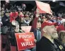  ?? PHOTO: REUTERS ?? Want that wall . . . Supporters hold placards during Trump’s rally in El Paso.