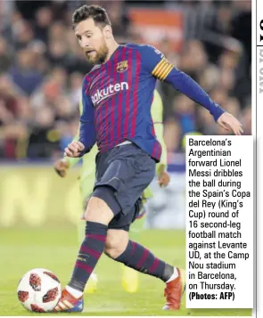  ?? (Photos: AFP) ?? Barcelona’s Argentinia­n forward Lionel Messi dribbles the ball during the Spain’s Copa del Rey (King’s Cup) round of 16 second-leg football match against Levante UD, at the Camp Nou stadium in Barcelona, on Thursday.