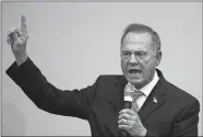  ?? BRYNN ANDERSON/AP PHOTO ?? U.S. Senate candidate Roy Moore speaks at a church revival Tuesday in Jackson, Ala.