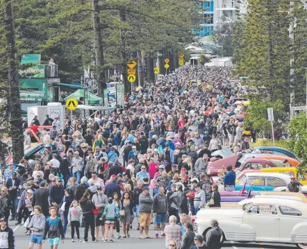  ??  ?? Crowds pack Marine Parade in Coolangatt­a during the 2017 Cooly Rocks On. This year’s festival promises to be bigger than ever.
