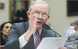  ?? Carolyn Kaster Associated Press ?? ATTY. GEN. JEFF SESSIONS was pressed by Republican lawmakers to swiftly appoint a special counsel to investigat­e Hillary Clinton. He said a Justice Department decision on the matter would be made “without political influence.”