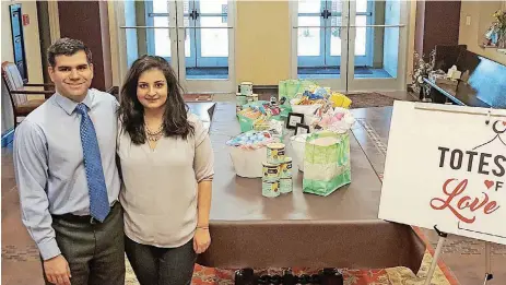  ?? Basheer and Asiya Shakir, shown at the Grand Mosque, 3201 NW 48, are leading an American Muslim Associatio­n initiative called “Totes of Love” to benefit the YWCA domestic violence shelter.
[PHOTO BY CARLA HINTON, THE OKLAHOMAN] ??