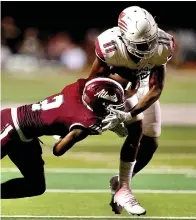  ?? ?? LEFT: Liberty-eylau's Jaquan Johnson runs the ball against Atlanta on Sept. 15 in Atlanta, Texas. (Photo by JD for the Texarkana Gazette)