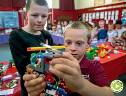  ?? WARWICK SMITH/STUFF ?? Isaac Kingston, right, organised a Lego show at his school, Huntervill­e School, Left is his brother Josh.