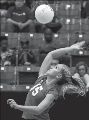  ?? Arkansas Democrat-Gazette/Mitchell P.E. Masilun ?? REDDIE TO STAR: Fountain Lake’s Olivia Cox spikes a hit for the West during the Arkansas High School Coaches Associatio­n’s All-Star volleyball match Friday at the Farris Center in Conway. Cox signed to play college volleyball at Henderson State in Arkadelphi­a.