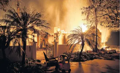  ?? PHOTO: TNS ?? Wildfire destroys homes in Goleta, California, as a heatwave brings unpreceden­ted high temperatur­es, yesterday.