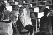  ?? AP/EVAN VUCCI ?? President Donald Trump listens Sunday during a ceremony to mark the opening of the Global Center for Combating Extremist Ideology in Riyadh, Saudi Arabia.