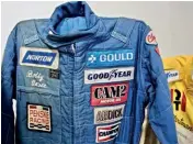  ??  ?? Opposite from top: 1951 Hudson Hornet, as driven by Herb Thomas; Richard Petty won 10 races in a row in his 1967 Plymouth. Above: Bill Elliott’s 1985 Ford Thunderbir­d earned him a cool $1m bonus; Talladega race suit worn by legend Bobby Unser