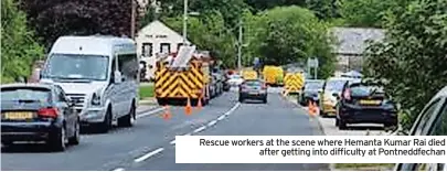  ?? ?? Rescue workers at the scene where Hemanta Kumar Rai died after getting into difficulty at Pontneddfe­chan